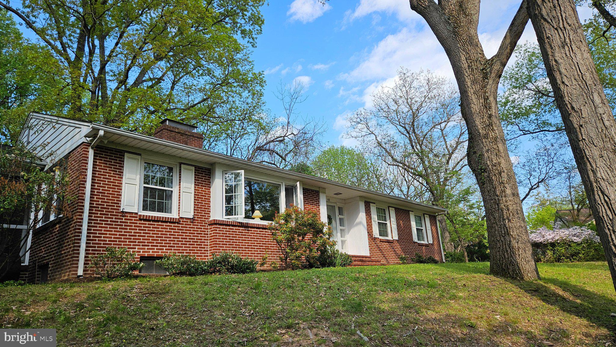 42 Sherwood Road Cockeysville, MD 21030 - Photo 42 of 44 Charming brick home in lush greenery.