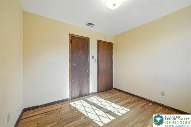 a living room with furniture fireplace and a flat screen tv