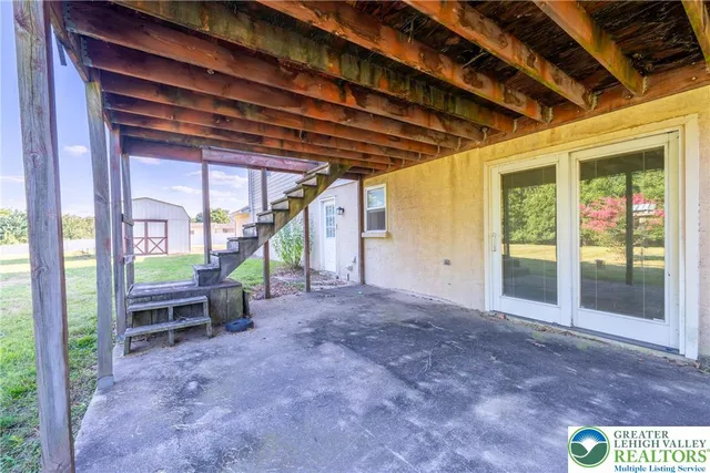 a view of a storage and utility room with a sink