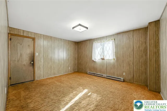 a view of swimming pool with a yard