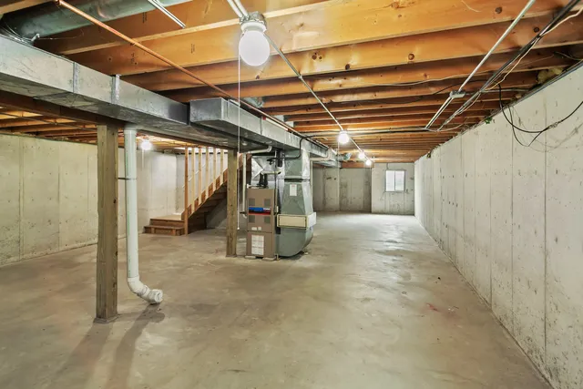 a view of a room with wooden walls