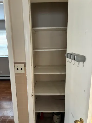 a bathroom with a toilet a sink and a shower