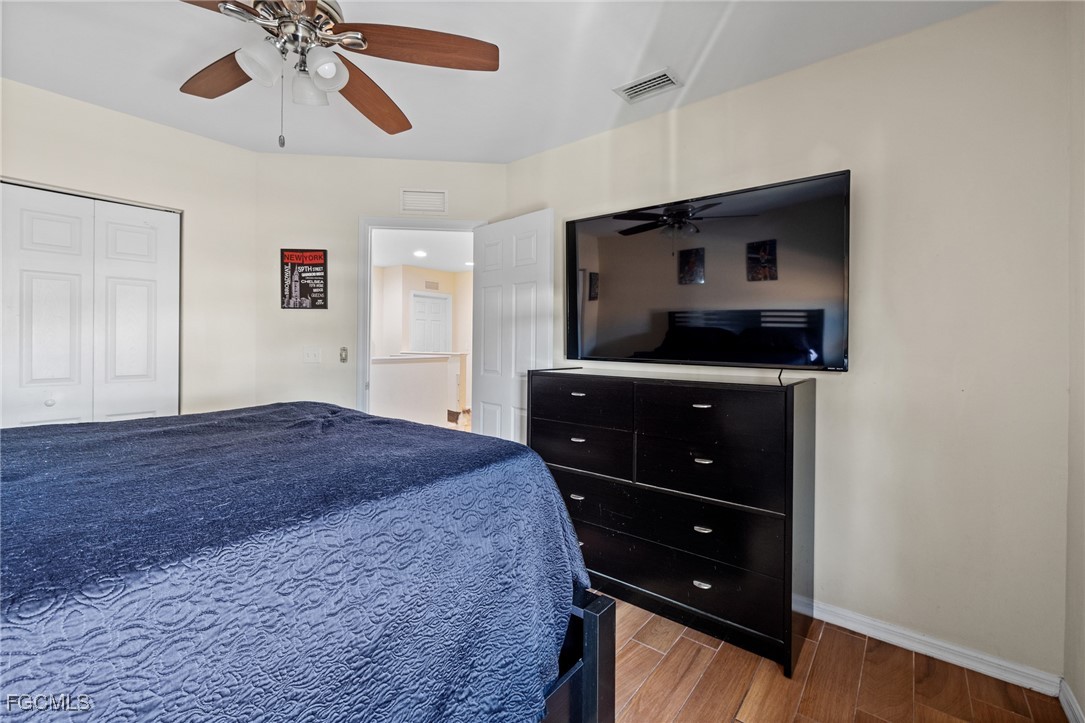 8657 Sumner Avenue Fort Myers, FL 33908 - Photo 24 of 29 a bedroom with a bed and a dresser