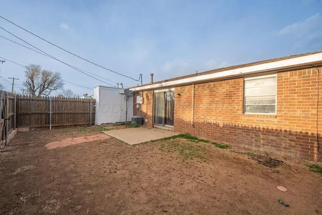a view of a backyard of a house