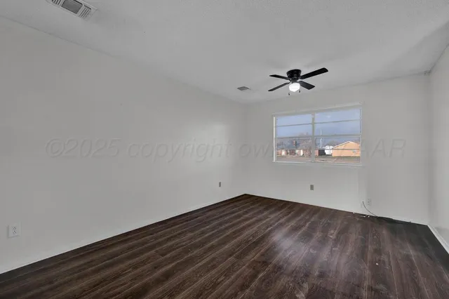 a utility room with cabinets