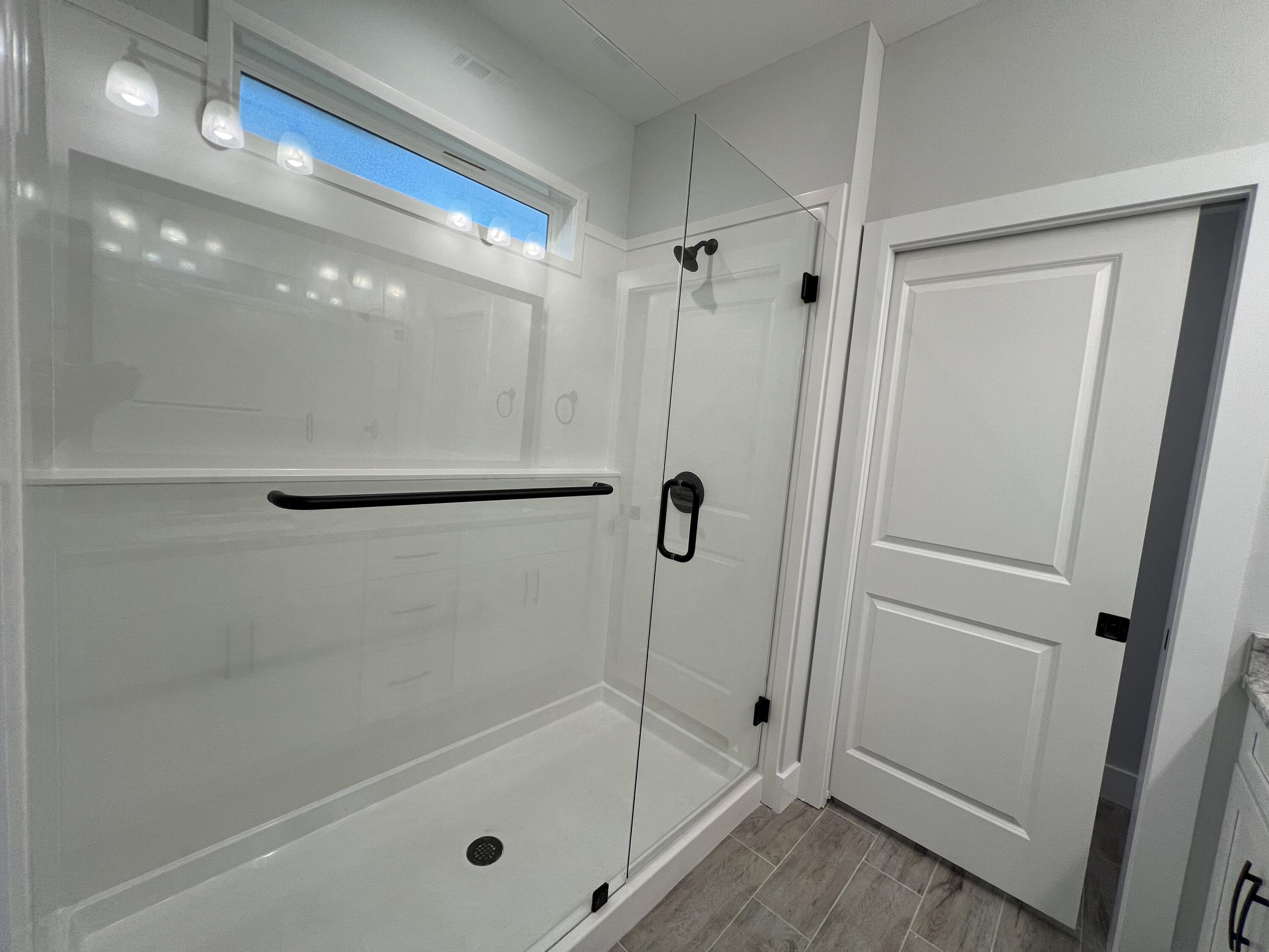 1491 Cat-Mar Road Niceville, FL 32578 - Photo 24 of 30 a bathroom with a glass shower door