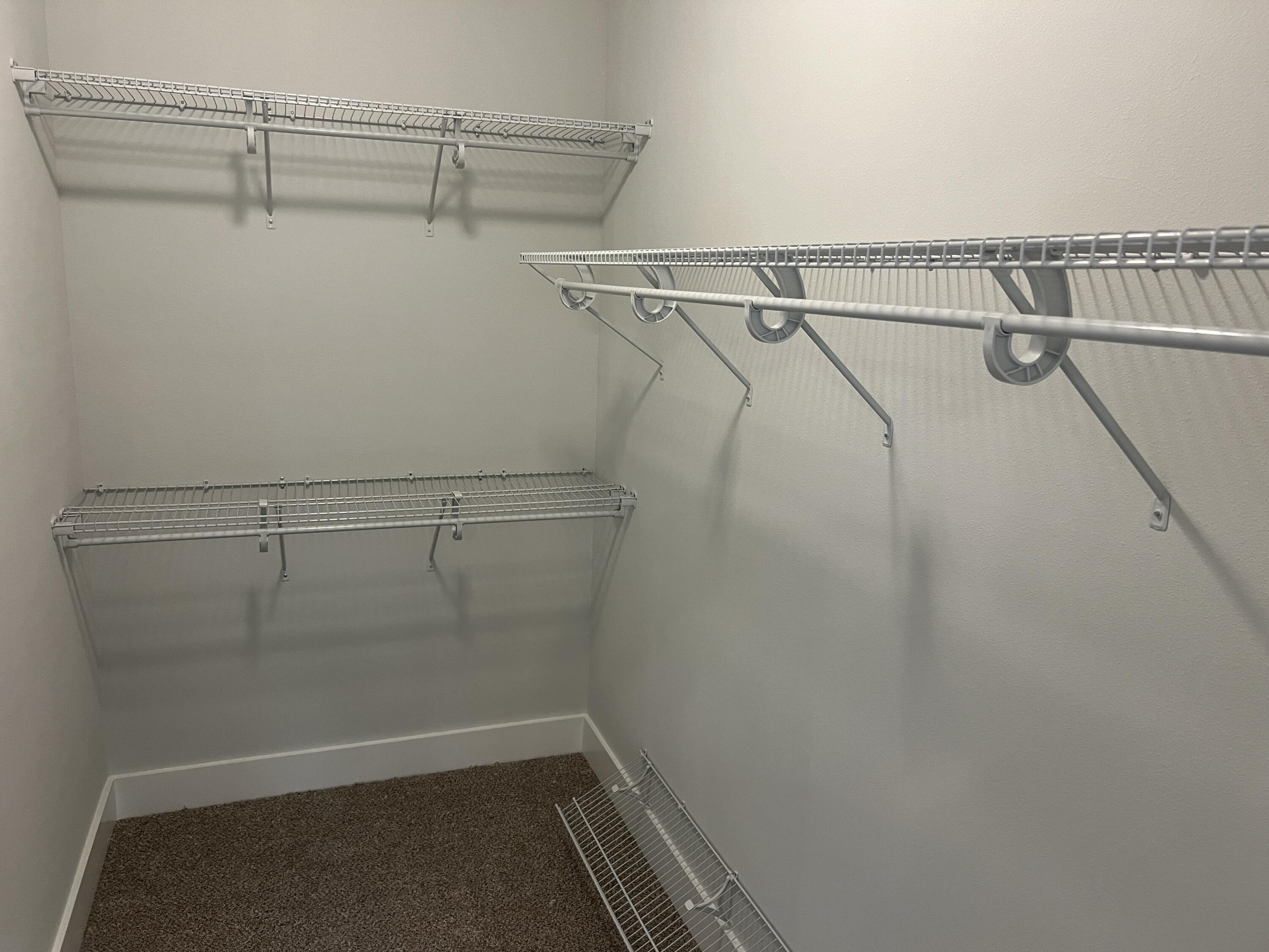 1491 Cat-Mar Road Niceville, FL 32578 - Photo 25 of 30 a view of a room with racks on the wall