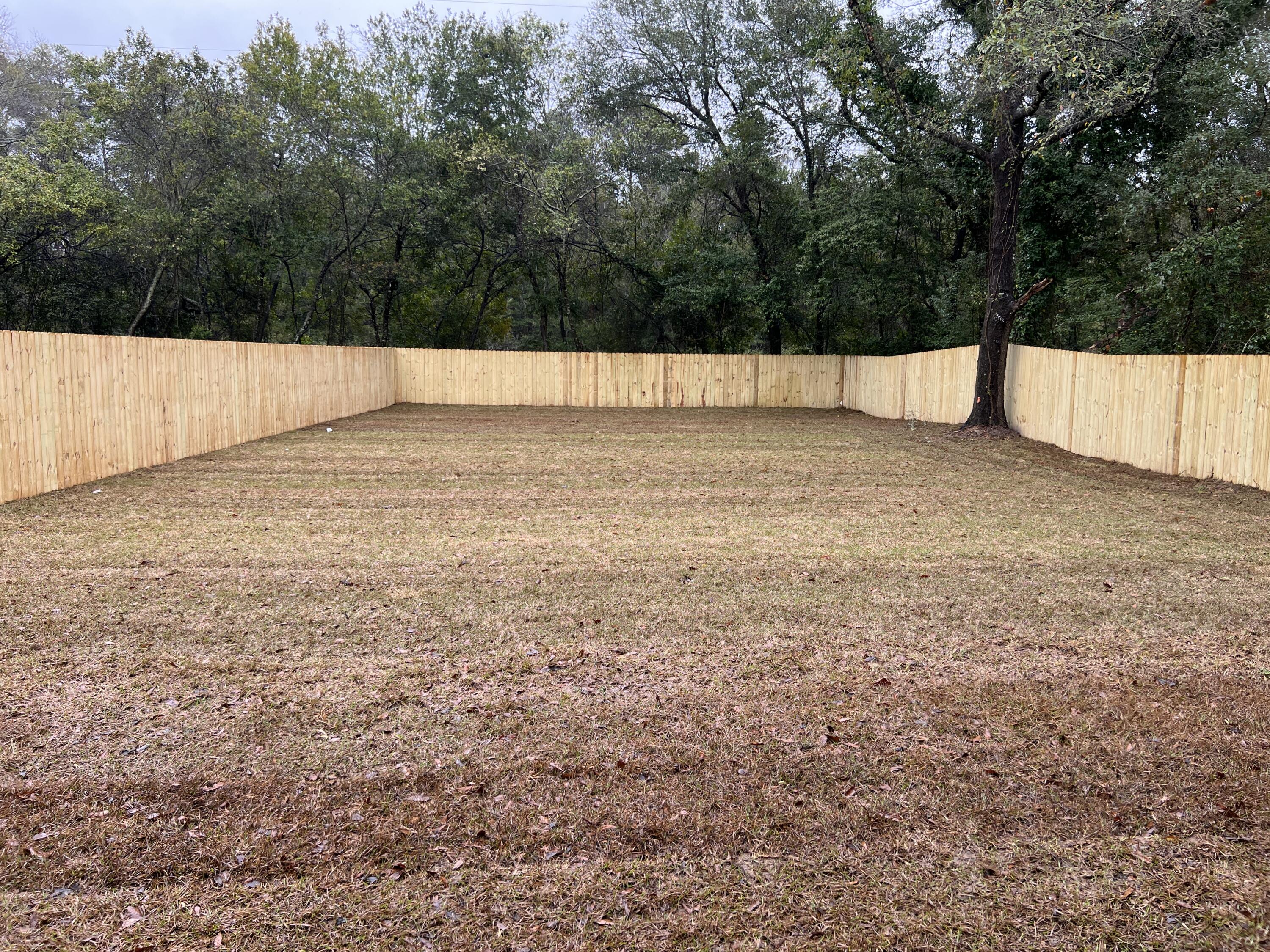 1491 Cat-Mar Road Niceville, FL 32578 - Photo 28 of 30 a view of an outdoor space and a yard