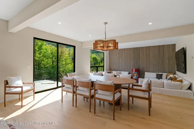 a view of a livingroom with furniture window and outside view