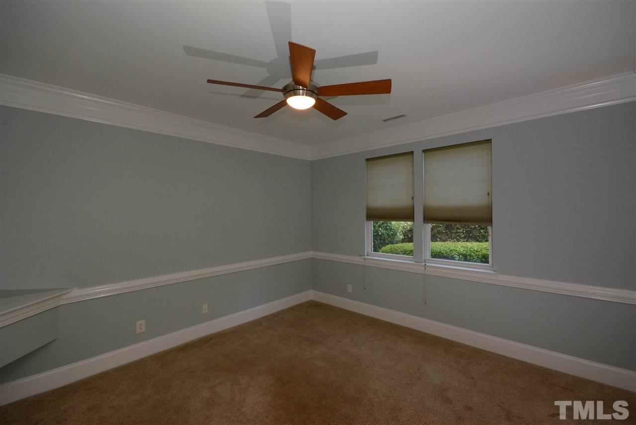 8315 Chimneycap Drive Raleigh, NC 27613 - Photo 3 of 13 an empty room with a window