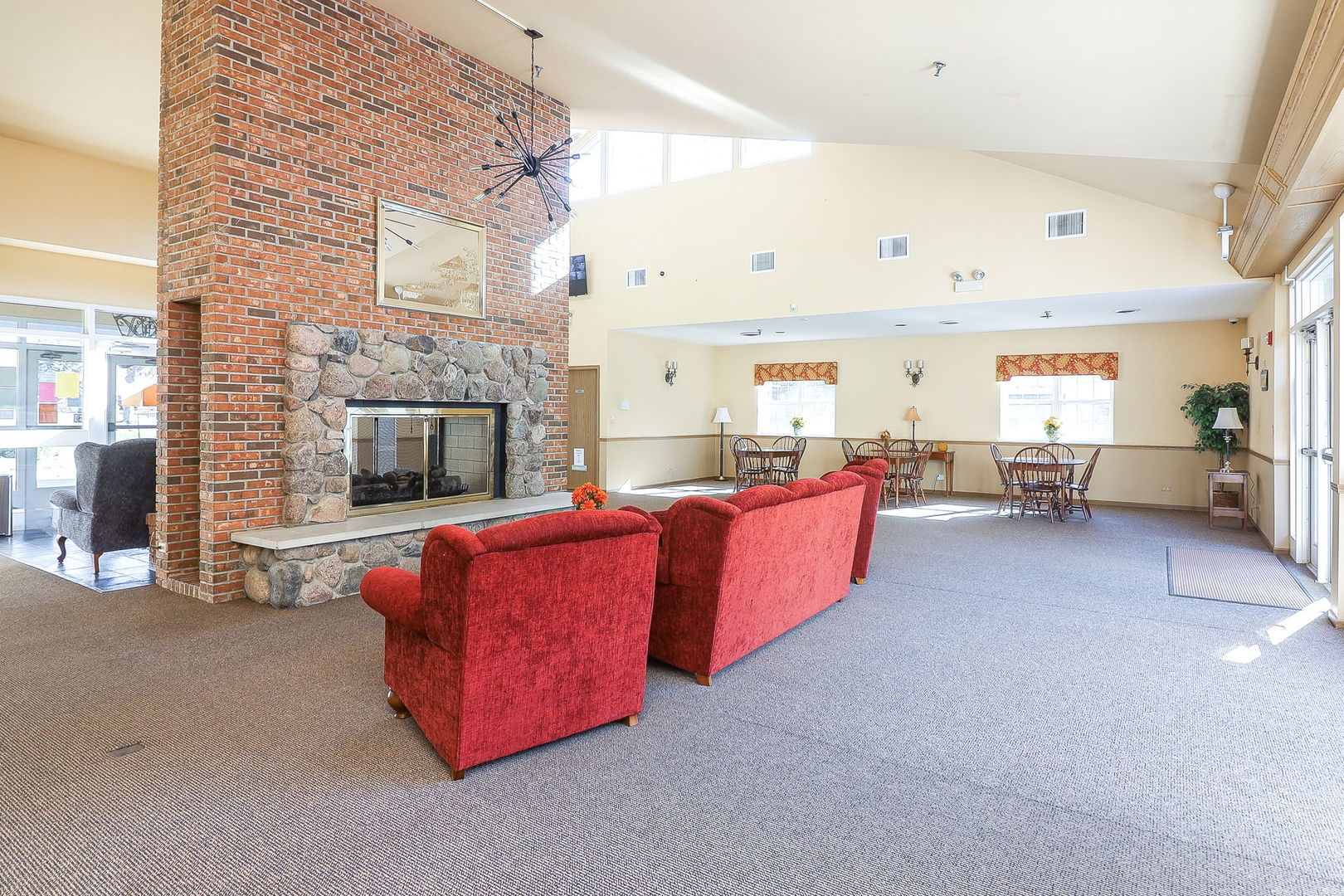 726 North Gary Avenue, Unit 109A Carol Stream, IL 60188 - Photo 15 of 22 a living room with furniture and a fireplace