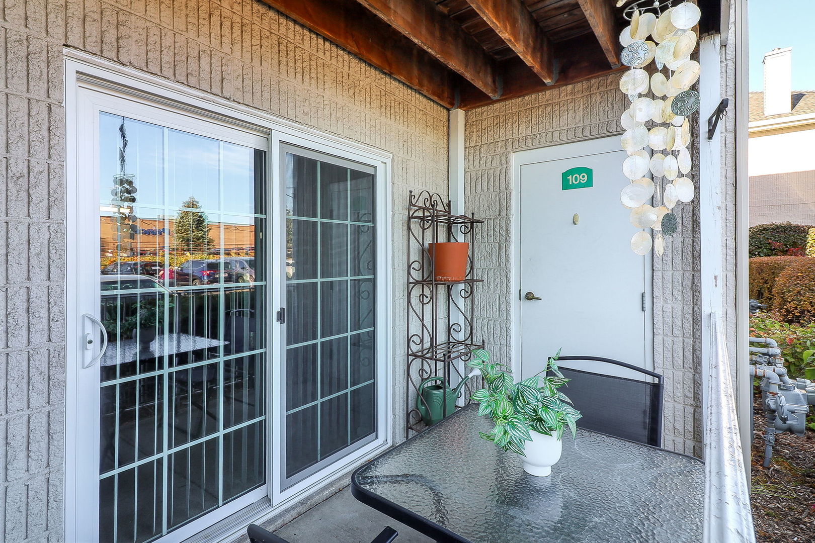 726 North Gary Avenue, Unit 109A Carol Stream, IL 60188 - Photo 2 of 22 a view of a potted plants next to a window