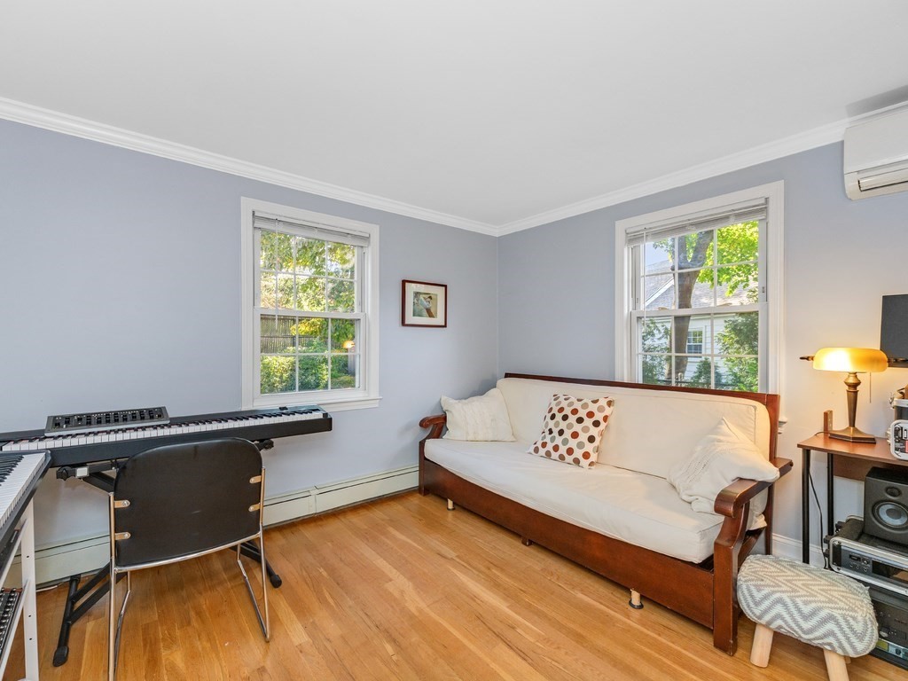 28 Truman Road Newton, MA 02459 - Photo 11 of 26 a view of a bedroom with furniture and a window