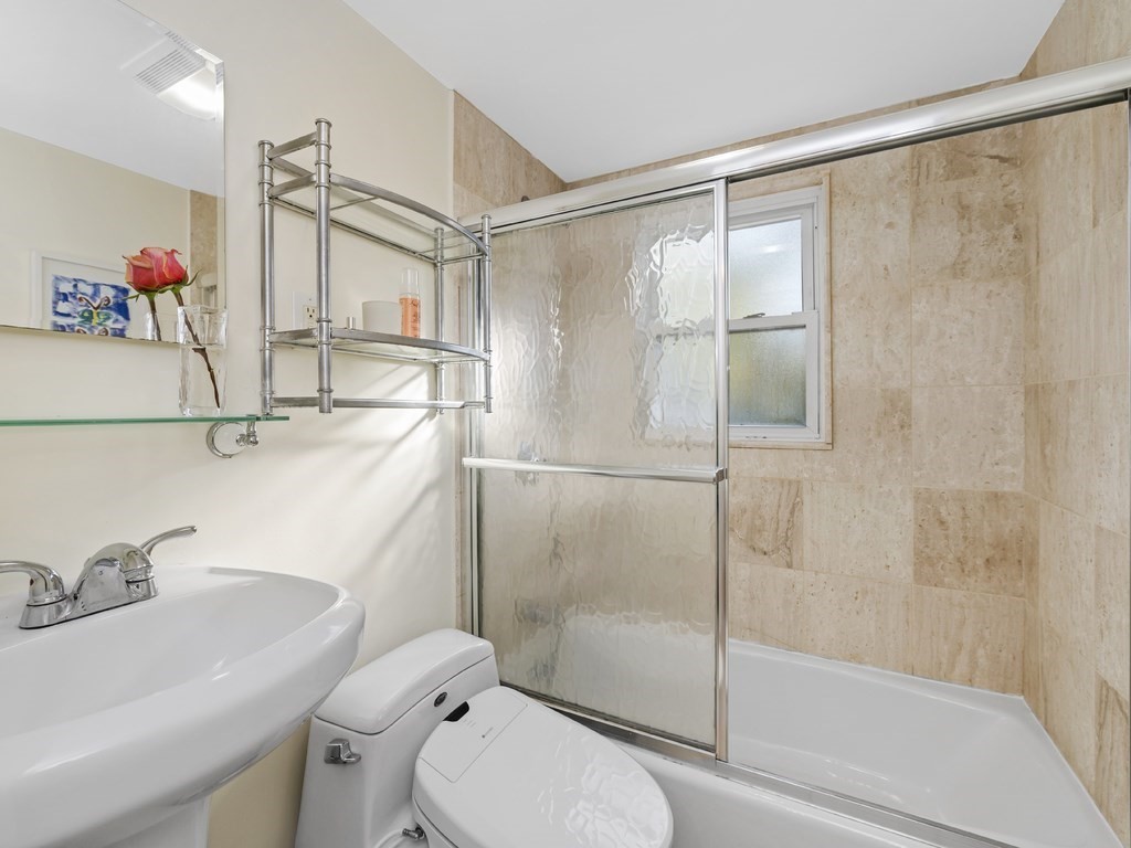 28 Truman Road Newton, MA 02459 - Photo 17 of 26 a bathroom with a sink toilet and shower