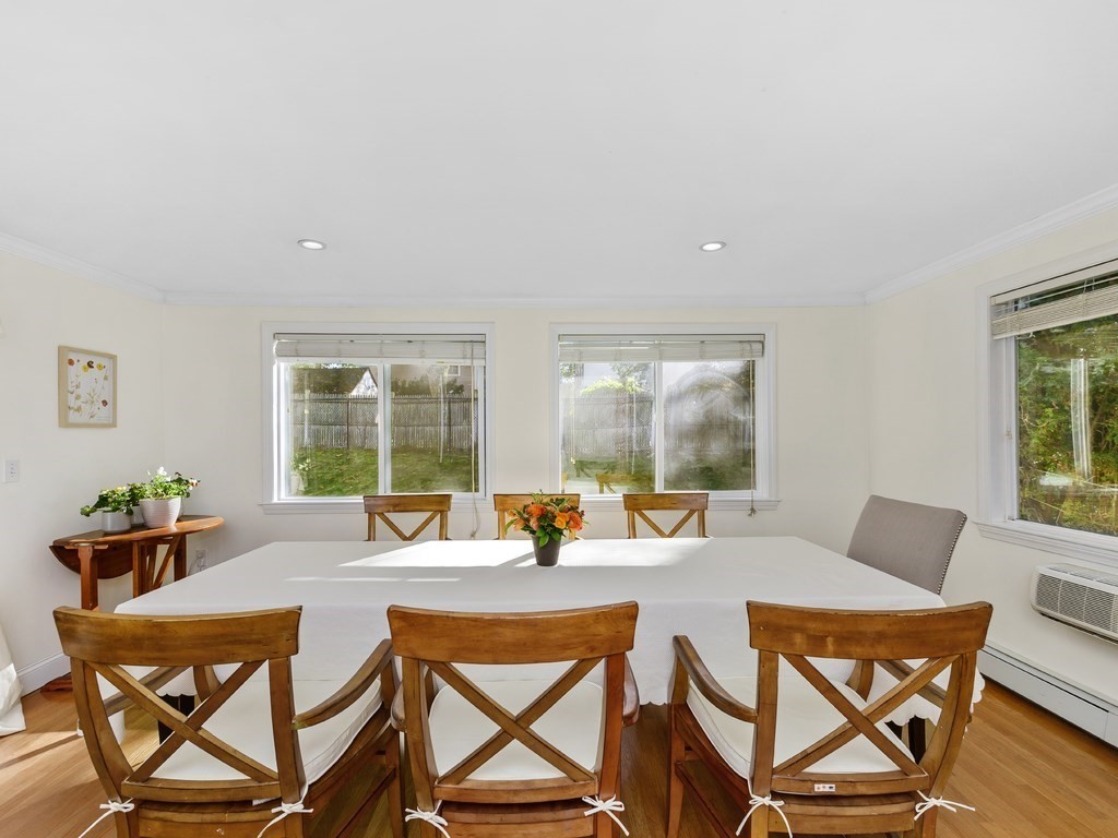 28 Truman Road Newton, MA 02459 - Photo 9 of 26 a dining room with furniture and wooden floor