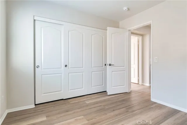 a view of a livingroom with wooden floor