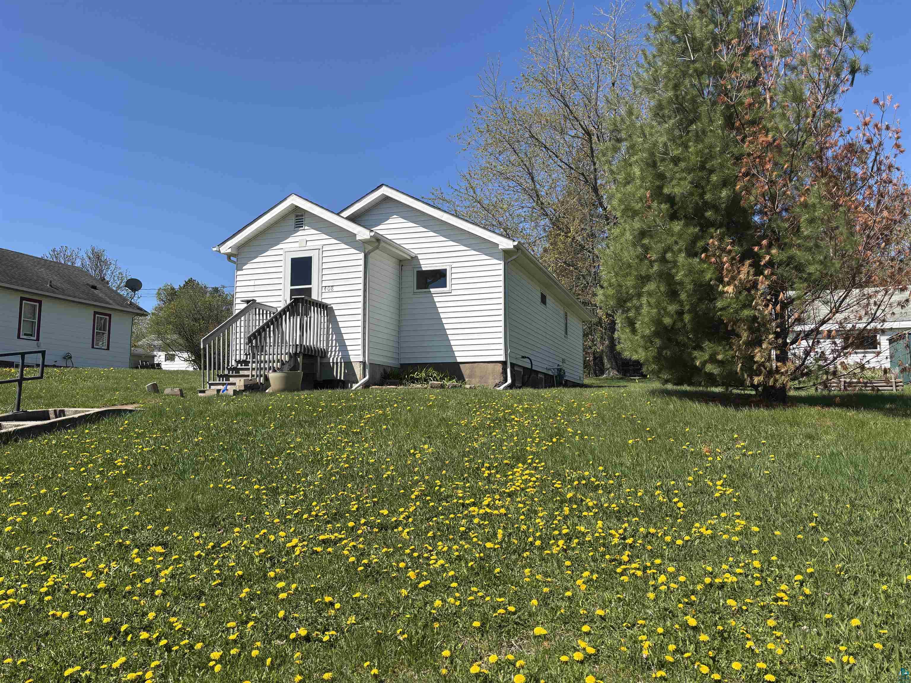 408 Midway Avenue Proctor, MN 55810 - Photo 3 of 20 View of home's exterior with a yard