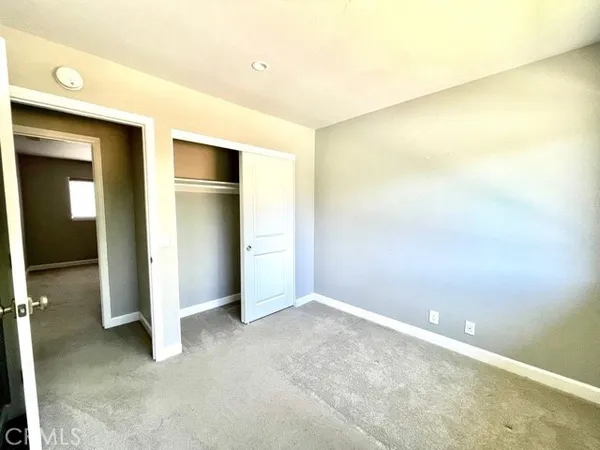 an empty room with closet