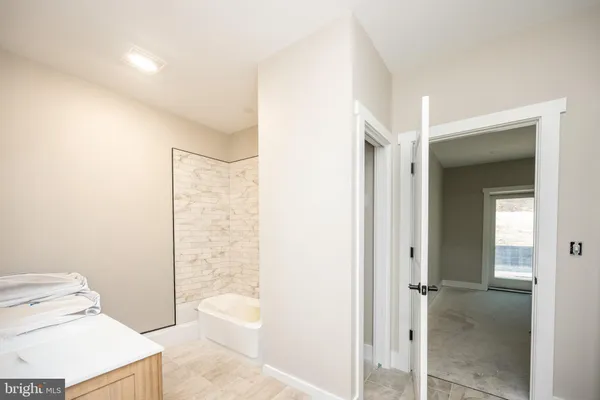a bathroom with a bathtub