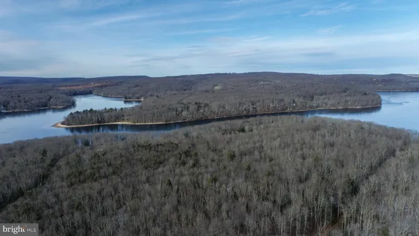 a view of a lake with a mountain in the background