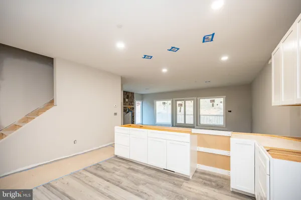 a large white room with a large window