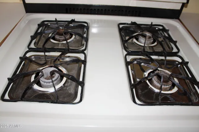 a view of a small space with wooden floor