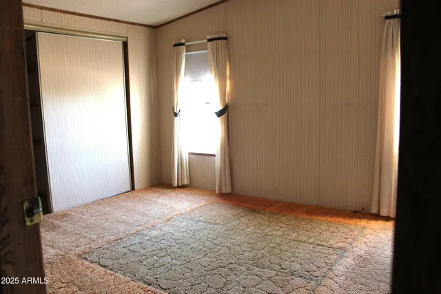 a view of a room with racks on the wall