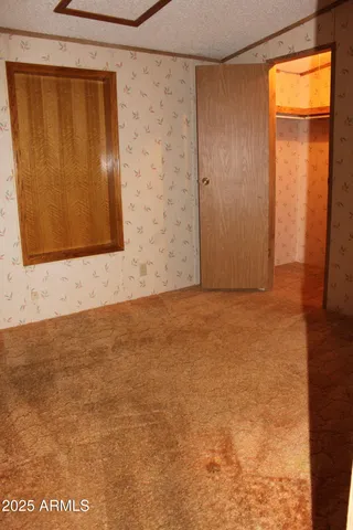 an empty room with a door