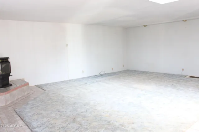 a view of a town with mountains in the background