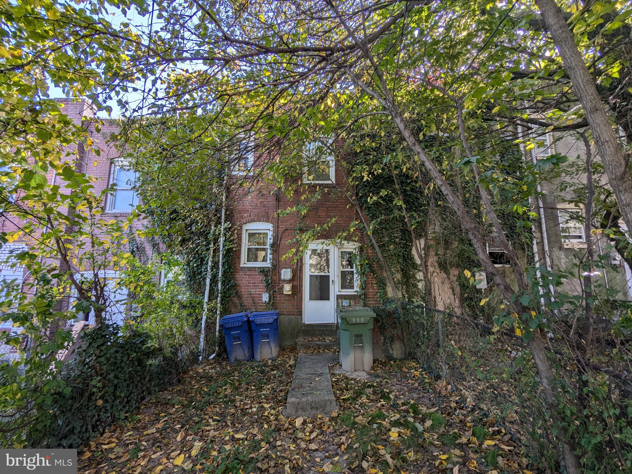 504 Bridgeview Road Baltimore, MD 21225 - Photo 9 of 12 a house is sitting in middle of forest