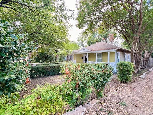 425 Grandview Avenue Dallas, TX 75223 - Photo 25 of 25 a front view of a house with a garden