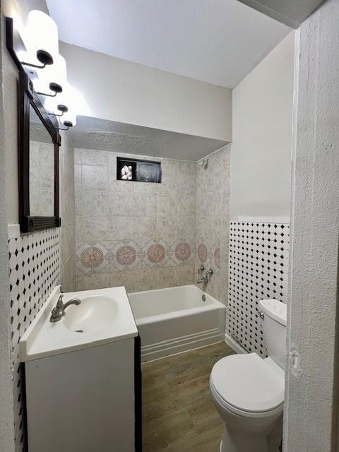 425 Grandview Avenue Dallas, TX 75223 - Photo 9 of 25 a bathroom with a sink a toilet and shower