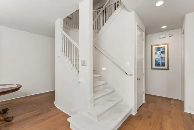 a view of a garden with a building in the background