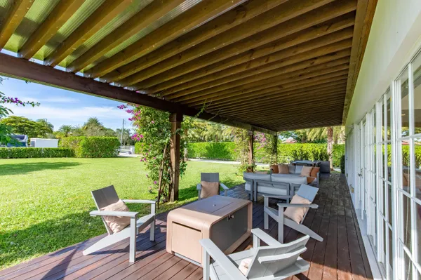 a view of yard with patio