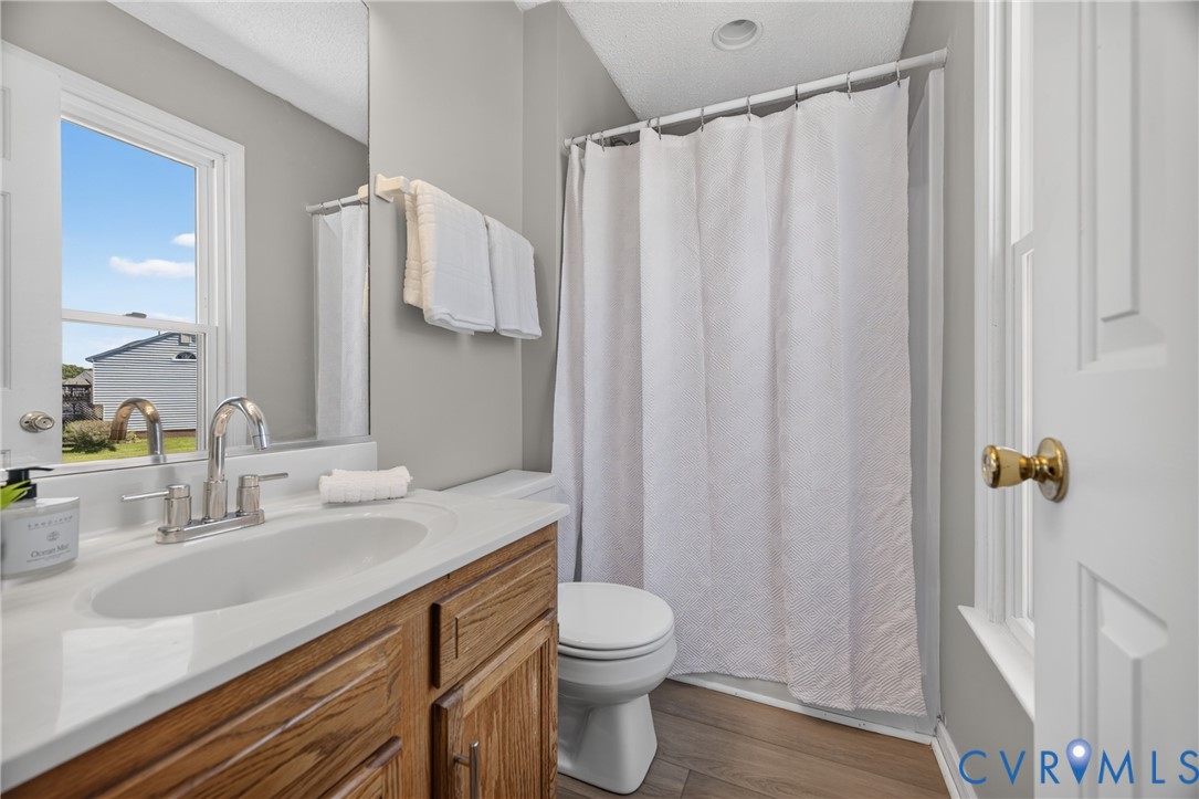 1559 Tree Ridge Road Henrico, VA 23231 - Photo 23 of 40 Bathroom featuring a wood-finish vanity with a whi