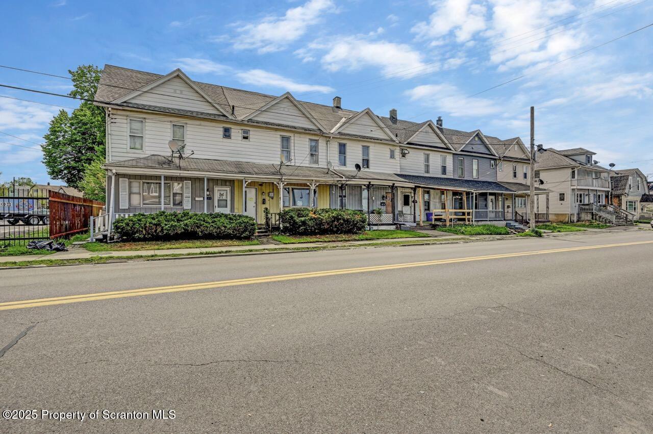 942 Providence Road Scranton, PA 18508 - Photo 2 of 25 a front view of a building with street view
