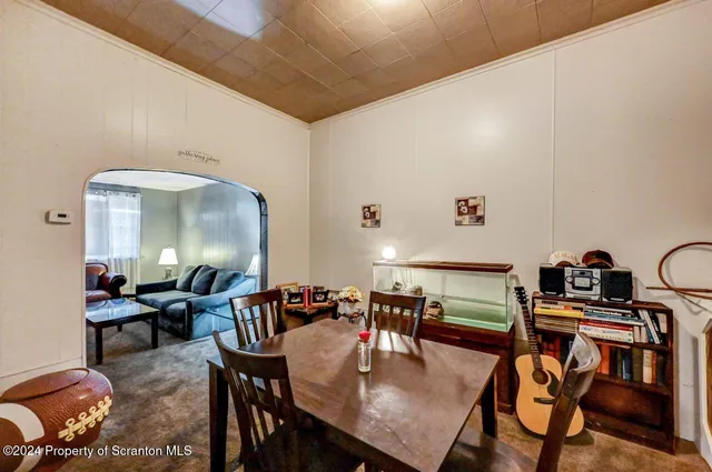 a view of a dining room with furniture