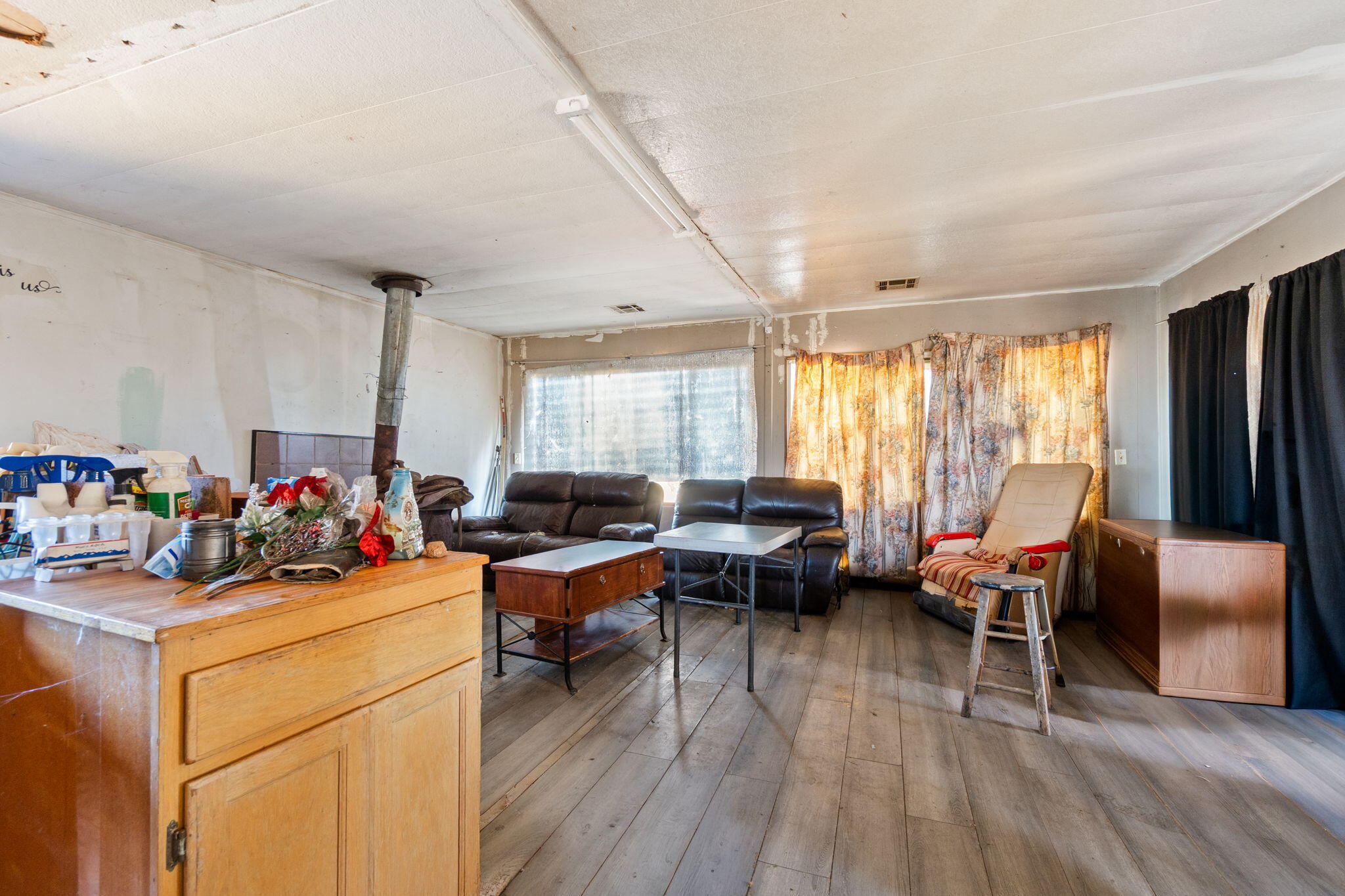13957 Gas Point Road Igo, CA 96047 - Photo 2 of 18 a view of a dining room with furniture window and wooden floor