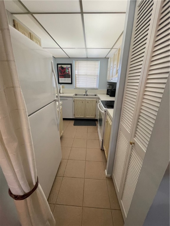 1100 Ponce De Leon Circle, Unit E306 Vero Beach, FL 32960 - Photo 25 of 30 a utility room with cabinets washer and dryer