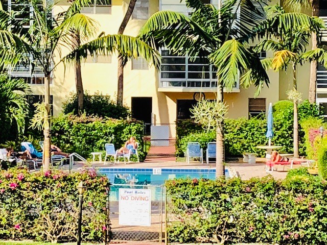 1100 Ponce De Leon Circle, Unit E306 Vero Beach, FL 32960 - Photo 3 of 30 front view of a house with a street