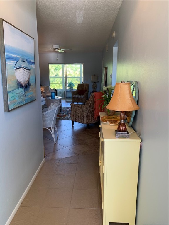 1100 Ponce De Leon Circle, Unit E306 Vero Beach, FL 32960 - Photo 6 of 30 a living room with furniture and a large window
