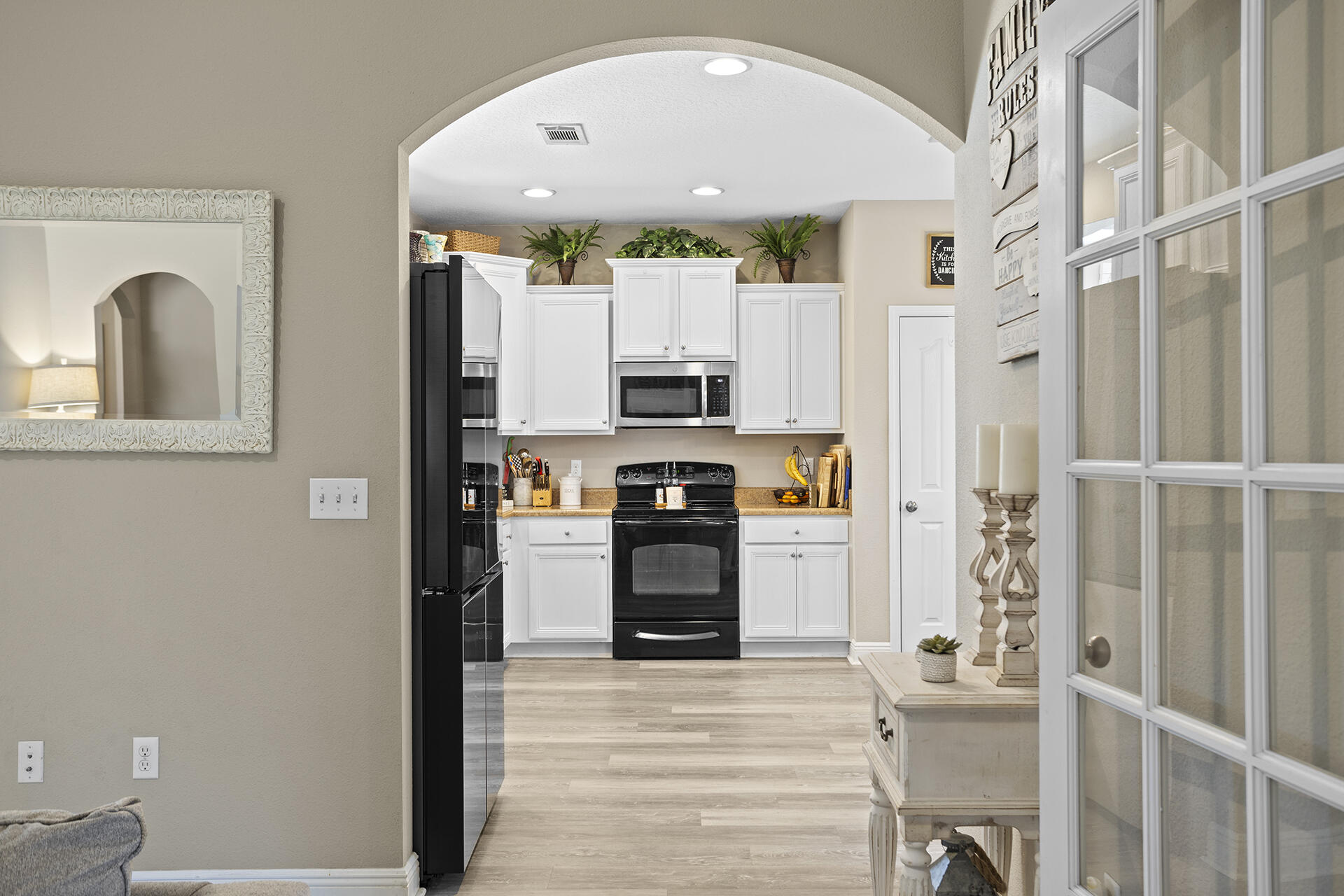 137 Old Ferry Road Santa Rosa Beach, FL 32459 - Photo 27 of 38 a view of a kitchen from a hallway