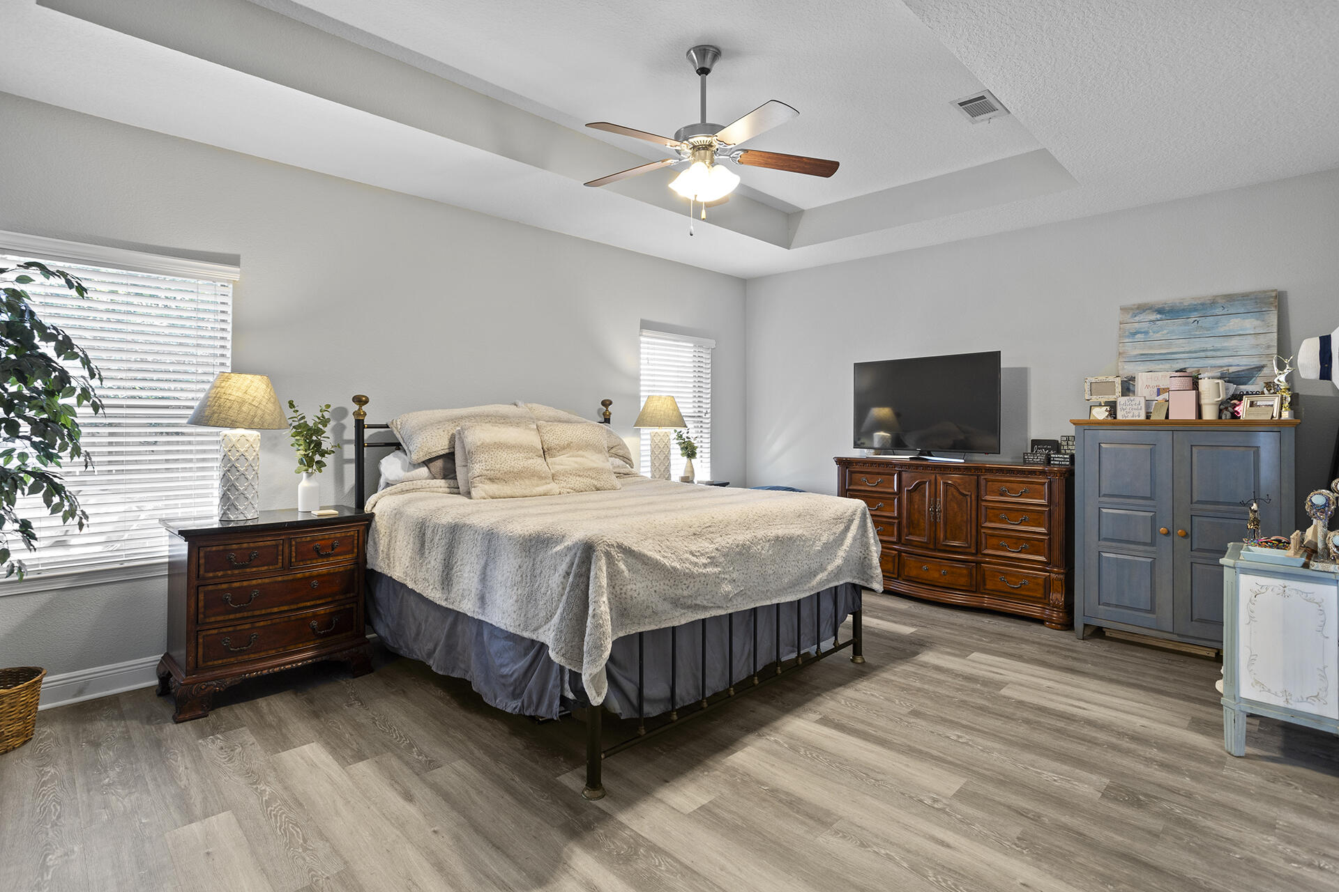 137 Old Ferry Road Santa Rosa Beach, FL 32459 - Photo 31 of 38 a bedroom with a bed and a chandelier