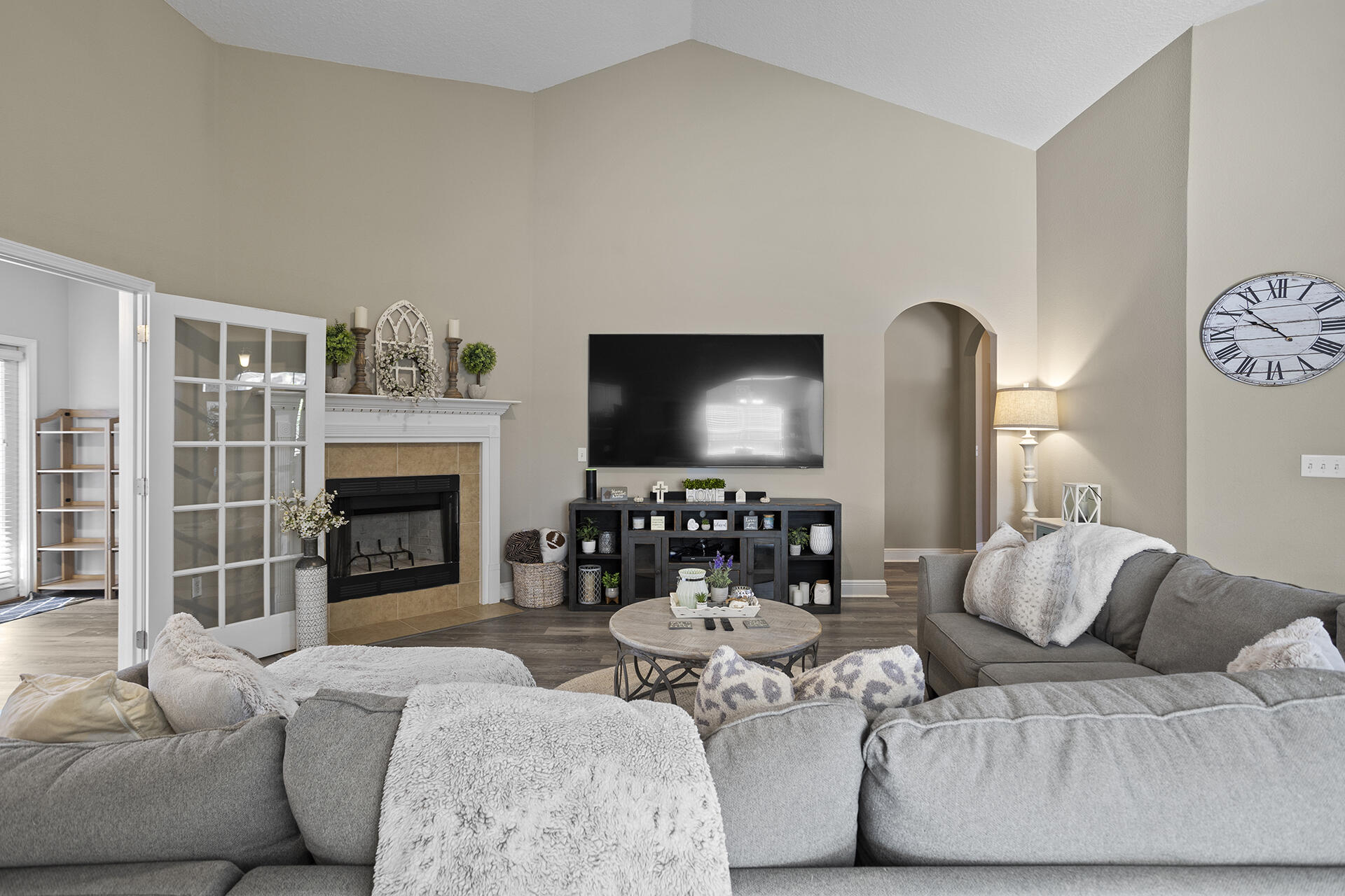 137 Old Ferry Road Santa Rosa Beach, FL 32459 - Photo 33 of 38 a living room with furniture fireplace and flat screen tv