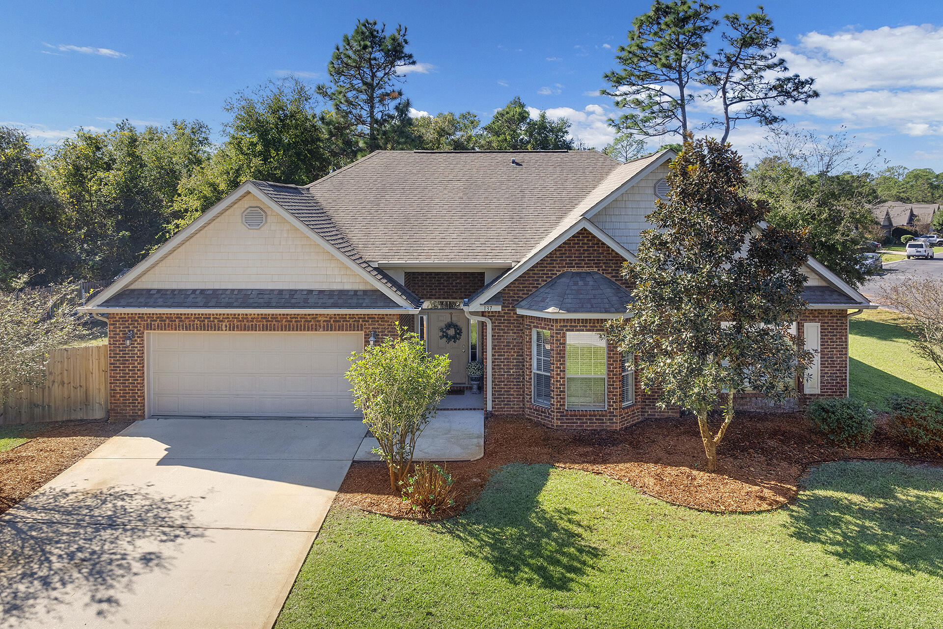 137 Old Ferry Road Santa Rosa Beach, FL 32459 - Photo 37 of 38 a house with garden in front of it