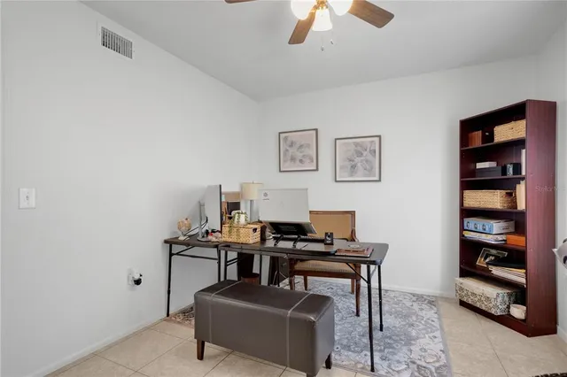 a view of a workspace with furniture