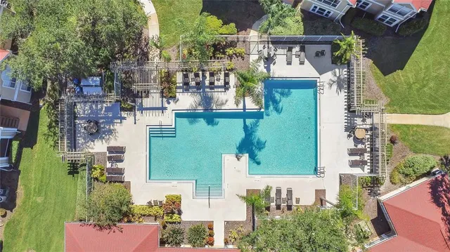 aerial view of a houses with street