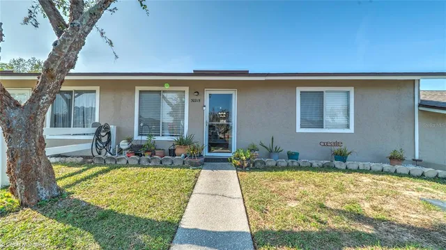 a view of swimming pool with outdoor seating