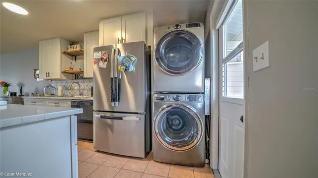 a utility room with dryer and washer