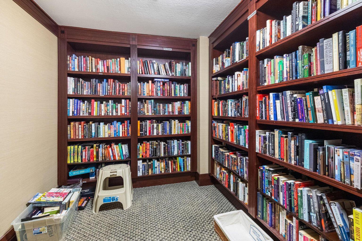 1900 South Ocean Boulevard, Unit 11B Lauderdale-by-the-Sea, FL 33062 - Photo 13 of 19 a view of a workspace with bookshelf